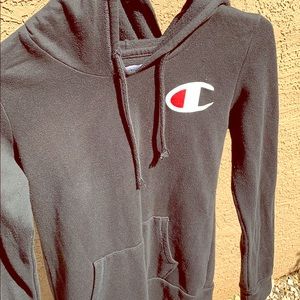 A black champion hoodie.